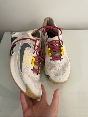 Nike Cream Sneakers with Maroon Laces and Yellow Accents